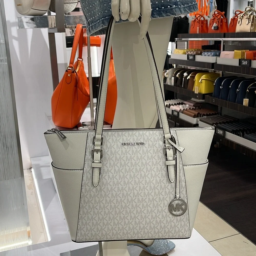 Michael Kors Charlotte Large Logo and Leather Top-Zip Tote Bag
Optic White
NWT - Picture 2 of 16